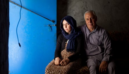 Zanab Ismail with her father Mohammed in Baharka refugee camp in Iraq
