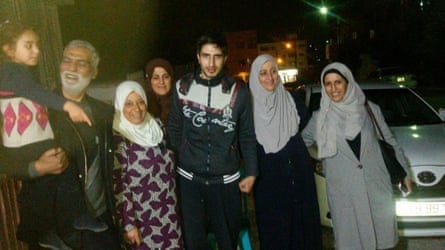  Hadi’s daughter Yara, Huda’s brother Khader (holding Yara), Khader’s wife, Layla, Huda’s sister Fatima, Hadi, Huda’s sister Amineh and Huda.