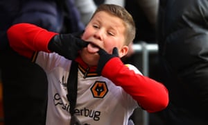 Cheeky happy young fan celebrates Wolves’ second.