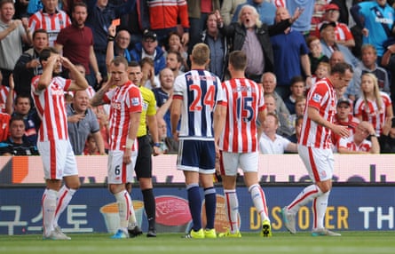 Charlie Adam leaves the field with Stoke down to nine men.