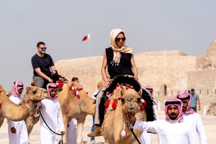 Woman rides camel