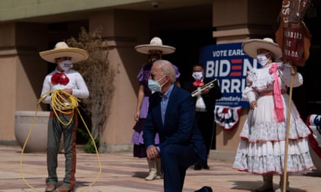 Democratic presidential candidate Joe Biden poses with supporters after speaking at the East Las Vegas Community Center about the effects of Covid-19 on Latinos in Las Vegas, Nevada.