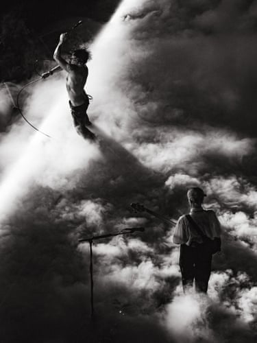 Yungblud and his bassist, Silke Blansjaar, engulfed in fog performing in Luxembourg