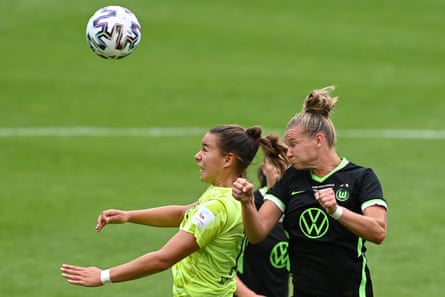 Wolfsburg’s Alexandra Popp challenges Lena Oberdorf, then playing for Essen, in the German Cup final in July.