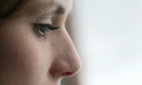 Closeup Profile of Depressed Young Woman