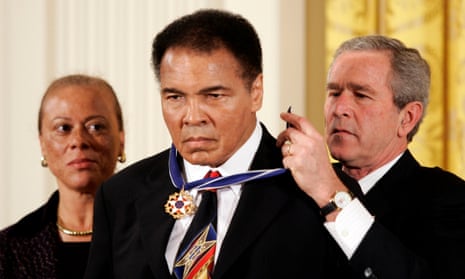 Bush awarding Ali with the Presidential Medal of Freedom in Washington.