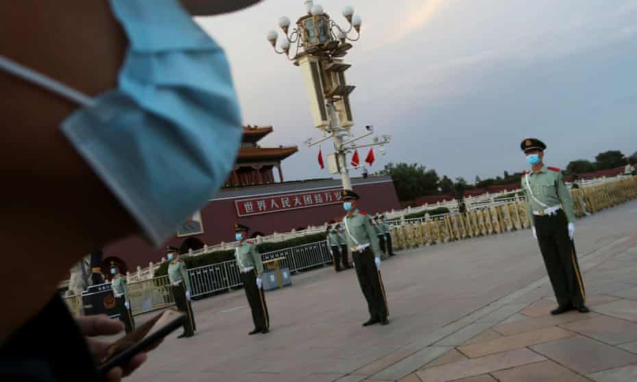 Police guard Tiananmen Square ahead of the National People’s Congress, which opens on Thursday.