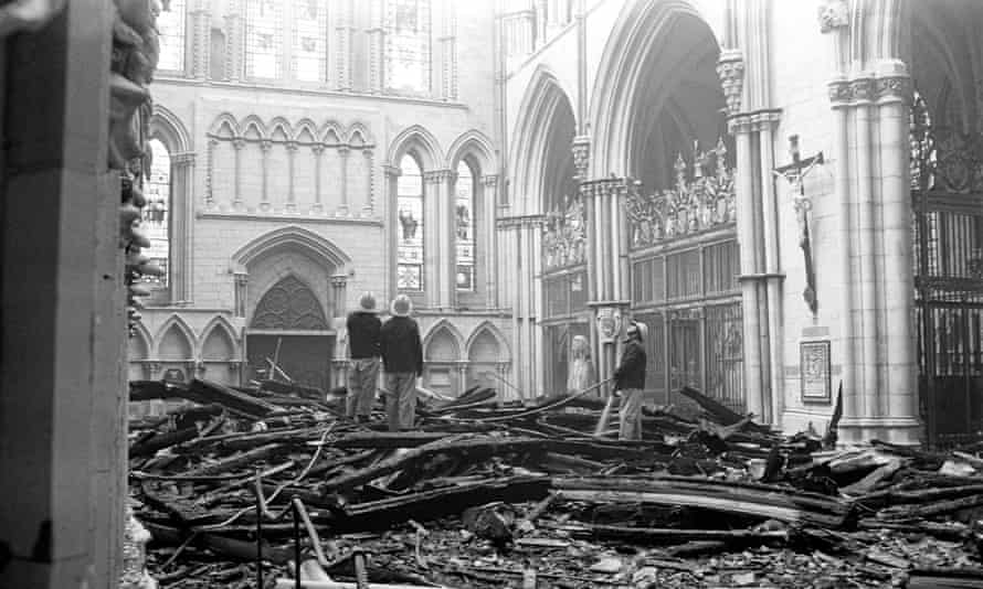 Firefighters surveying the damage to the south transept of York Minster, 1984.