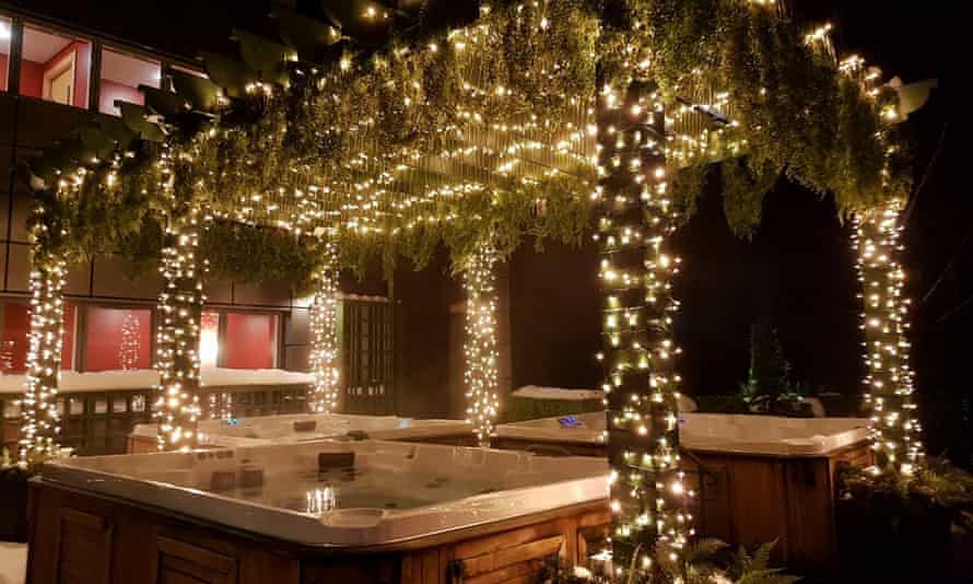 A fairy-lit hot tub at Stobo Castle in Scotland