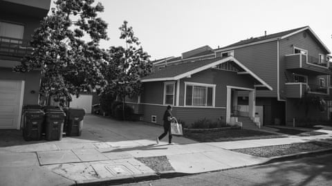 Leeann, a nursing student at Long Beach City College, walks next to the supportive housing unit.