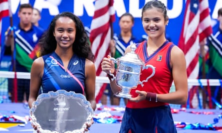 Leylah Fernandez and Emma Raducanu with their trophies at the end of the match