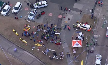 An aerial view of emergency personnel working at the scene.
