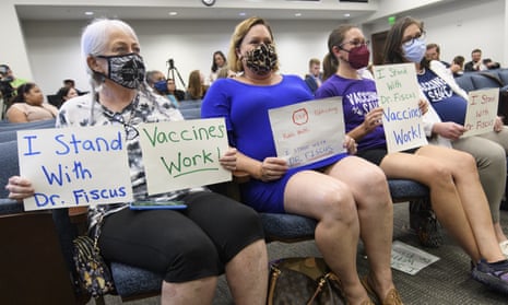 Vaccine advocates wait for the start of a state legislative committee meeting, on 21 July in Nashville, Tennessee, after the firing of Dr Michelle Fiscus.