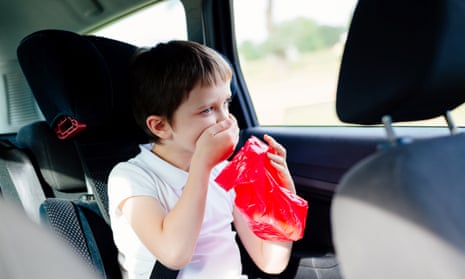 A child suffering car-sickness. Posed by model.