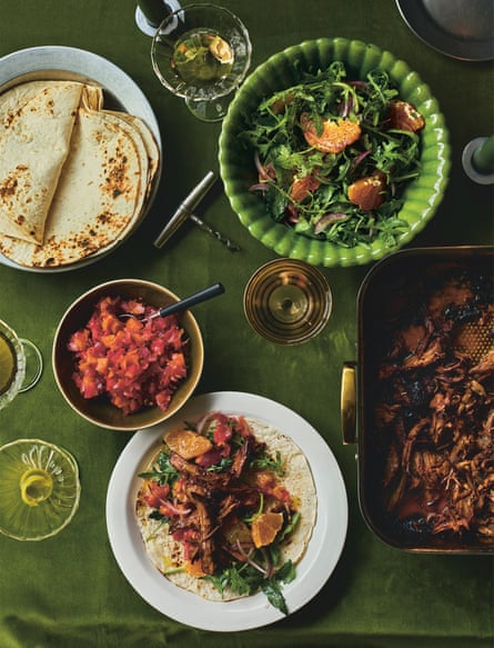dishes of meat and salad with flatbreads