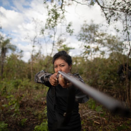 A female Forest Guardian activist gets ready to leave Zutiwa during a recent crackdown on illegal loggers