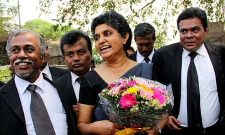 Sri Lanka’s former chief justice Shirani Bandaranayake is greeted by lawyers at the Supreme Court complex in Colombo on January 28, 2015, after new Sri Lankan President Maithripala Sirisena restored her position saying that her sacking two years ago was illegal. 