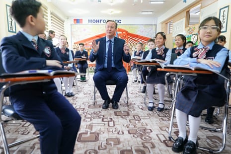 David Cameron, the foreign secretary, meeting pupils and taking part in an English lesson at School No.23 in Ulaanbaatar, Mongolia, on the fifth and final day of his tour of the Central Asia region.