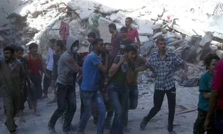 People are pulled from the rubble this week in east Aleppo after airstrikes this week.