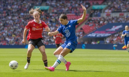 Sam Kerr (right) takes on Maya Le Tissier