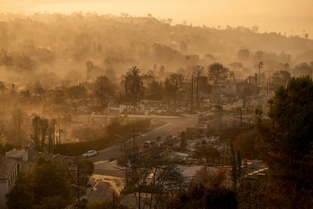 A neighborhood lies in ruin after a wildfire.