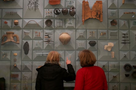 Visitors stand in front of Roman-era items at the London Mithraeum, Bloomberg SPACE, in London.