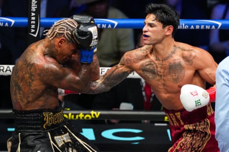 Ryan Garcia lands a punch on Conor Benn during their WBC welterweight title fight at T-Mobile Arena in Las Vegas.