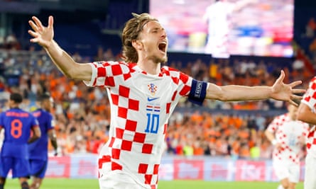 Luka Modric celebrates scoring against Netherlands