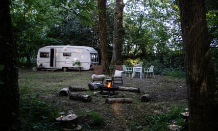 The Scrumpling caravan and campfire area in Somerset, UK.