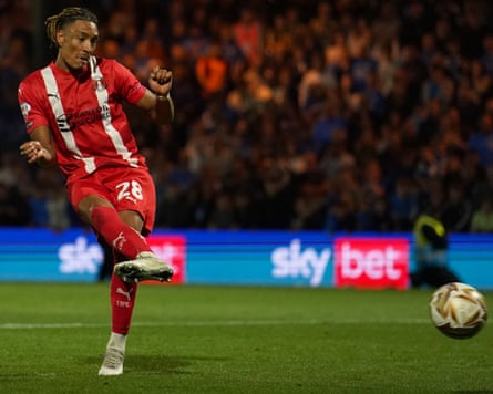 Leyton Orient's Sean Clare scores in the penalty shootout against Stockport.