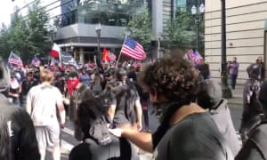 Protesters of the rightwing group Patriot Prayer clash with protesters from anti-fascist groups in Portland, Oregon.