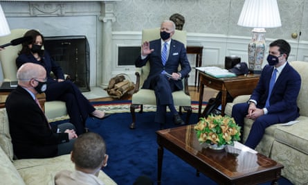 Biden with Buttigieg and other members of the bipartisan group at the White House on Thursday.