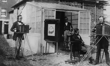 Pioneering photographer William Henry Fox Talbot, right, at work.