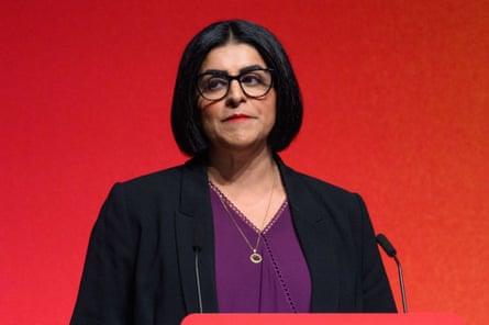 Shabana Mahmood MP speaks at a podium against a red background at a conference