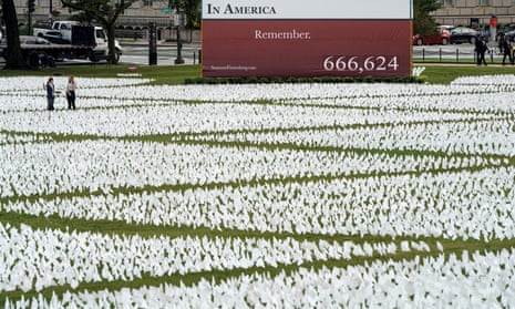 An art installation of more than 650,000 white flags representing Americans who have died of coronavirus are placed over 20 acres of the National Mall in Washington DC.