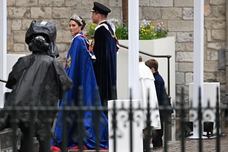 Catherine, Princess of Wales and Prince William, Prince of Wales with two of their children.