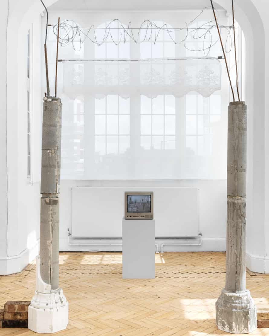 Jesse Darling's enclosure includes a TV, lace pelmet and barbed wire