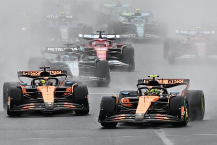 Lando Norris of McLaren leads into turn 1 of the Australian Grand Prix