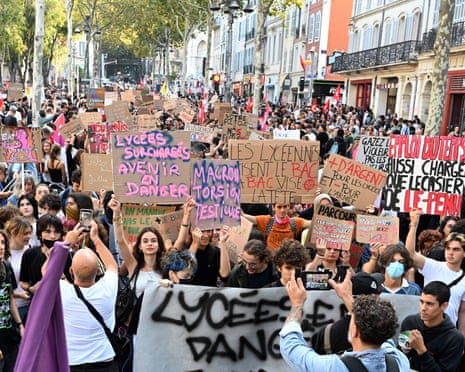Protesters take part in a demonstration of high-school students as part of a nationwide protest movement over learning conditions in Marseille, south-eastern France.