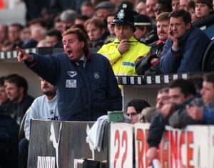The West Ham manager Harry Redknapp shouts some encouragement as West Ham take on Derby County in February 1997.