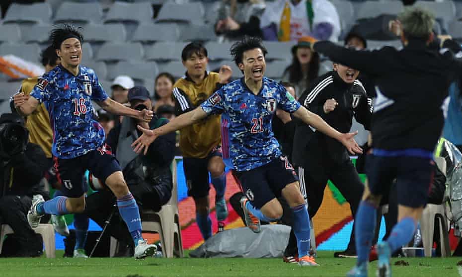 Kaoru Mitoma of Japan celebrates a goal with teammates.