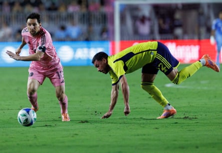 Inter Miami CF forward Lionel Messi (L) in action against Nashville SC defender Dan Lovitz (R) during the MLS soccer match between Inter Miami CF and Nashville SC soccer at Chase Stadium in Fort Lauderdale, Florida, USA, 08 November 2025