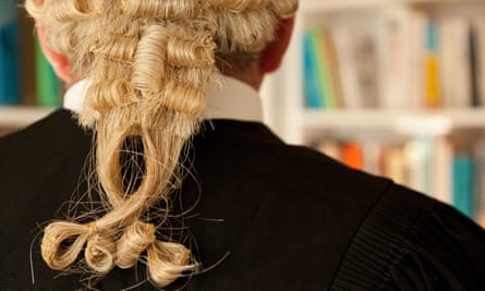 Male barrister pictured from behind wearing a wig
