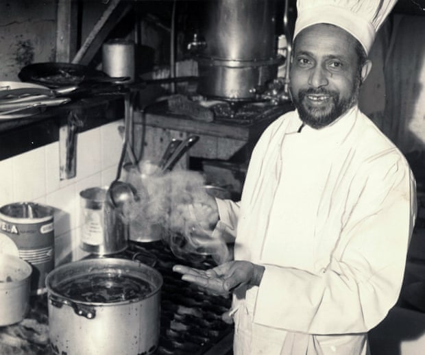 The cook prepares a curry at the Bombay Restaurant, Manchester, 1957.