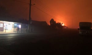David Bruggeman took this photo of Wingello as he escaped from a bushfire that tore through the town on Saturday night