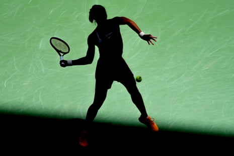 Zheng Qinwen returns a shot to Aryna Sabalenka during their quarter-final at the 2023 US Open.