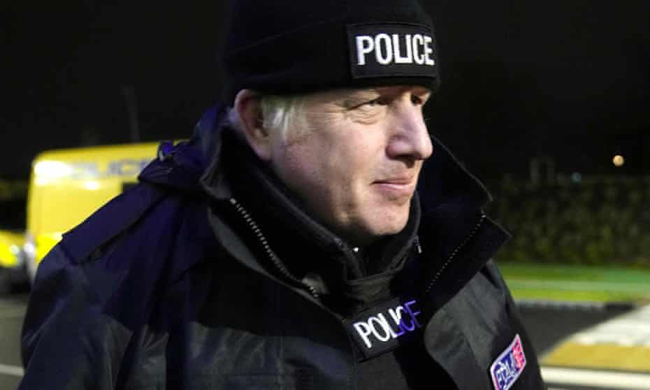 Boris Johnson with a Merseyside police drug raid on a home in Liverpool