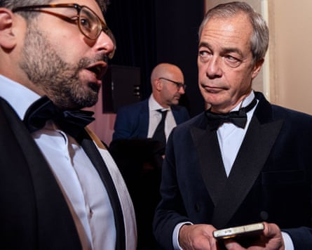 Nigel Farage and Raheem Kassam in black tie chatting