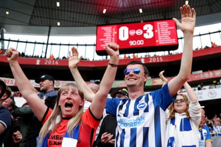 Arsenal, the Premier League title race and charges of ‘bottling’ | Soccer 1 Brighton fans celebrate.