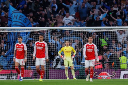 Arsenal’s players react after conceding a goal